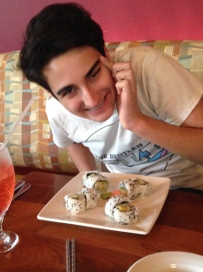 My middle son, who loves sushi and funny faces.